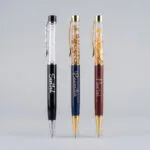 Premium gold flake pen with custom logo and name branding for corporate gifting - view 7