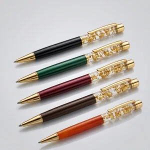 Premium gold flake pen with custom logo and name branding for corporate gifting