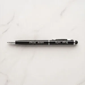 Custom engraved slim metal pen with stylus tip, presented as a premium gift