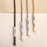 Engraved vertical bar name pendants with chains in black, rose gold, silver and gold
