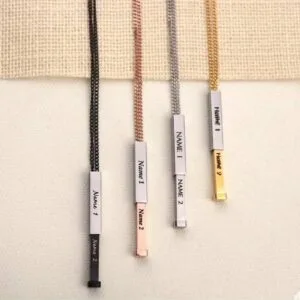 Engraved vertical bar name pendants with chains in black, rose gold, silver and gold