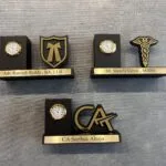 Wooden desk clocks with profession emblems and engraved name plates for doctors and advocates