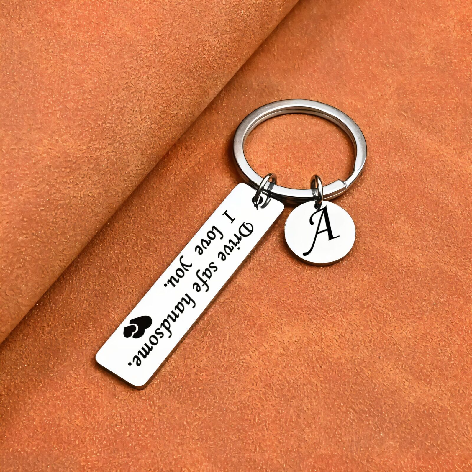 Personalised drive safe keyring engraved with a message and initial charm