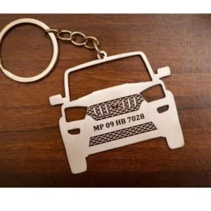 Personalised car shaped metal keychain with registration number laser engraved on the number plate