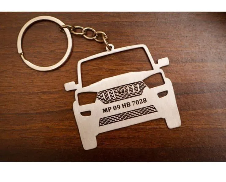 Personalised car shaped metal keychain with registration number laser engraved on the number plate