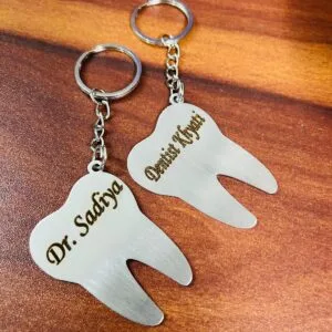 Tooth shaped steel keychains engraved with dentist names for doctors