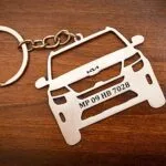 Laser cut steel car keyring engraved with a custom vehicle number