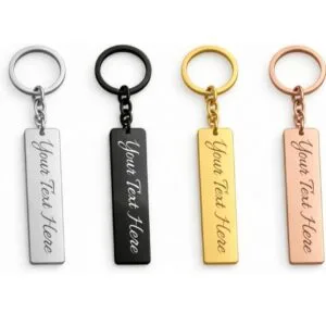 Engraved rectangle keychains in silver, black, gold and rose gold finishes