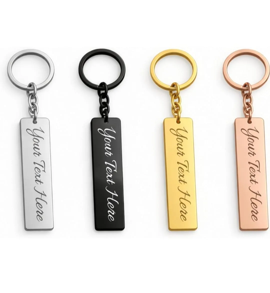 Engraved rectangle keychains in silver, black, gold and rose gold finishes