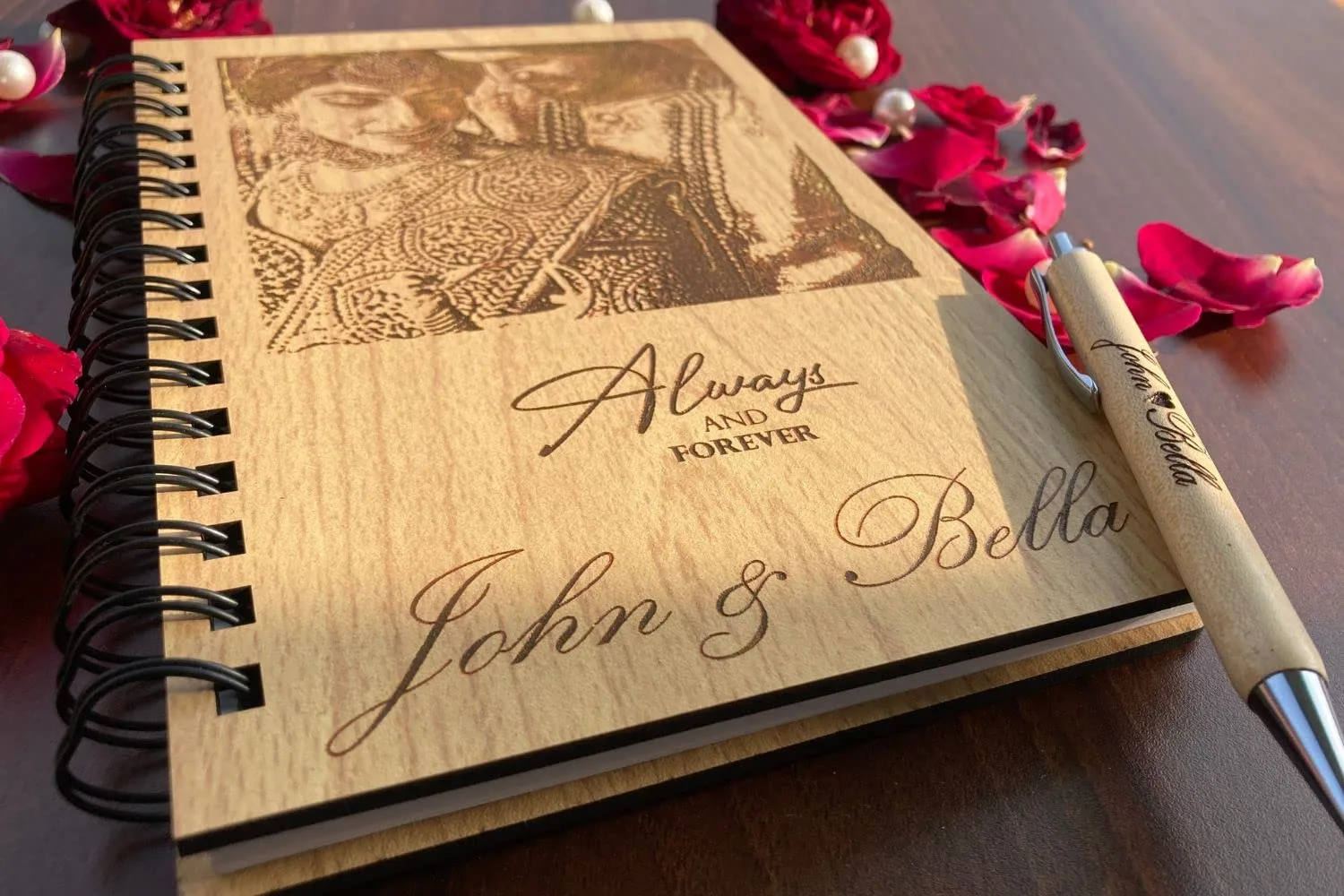 Engraved wooden album cover with a couple portrait and their names