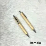 Two light wood pens engraved with a personalised name
