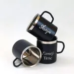 Black enamel camping mugs with names engraved on the side