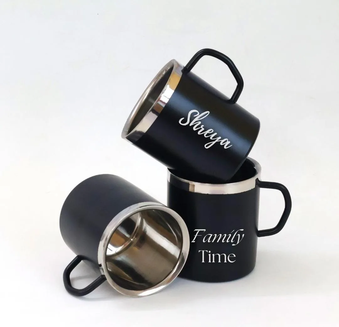 Black enamel camping mugs with names engraved on the side
