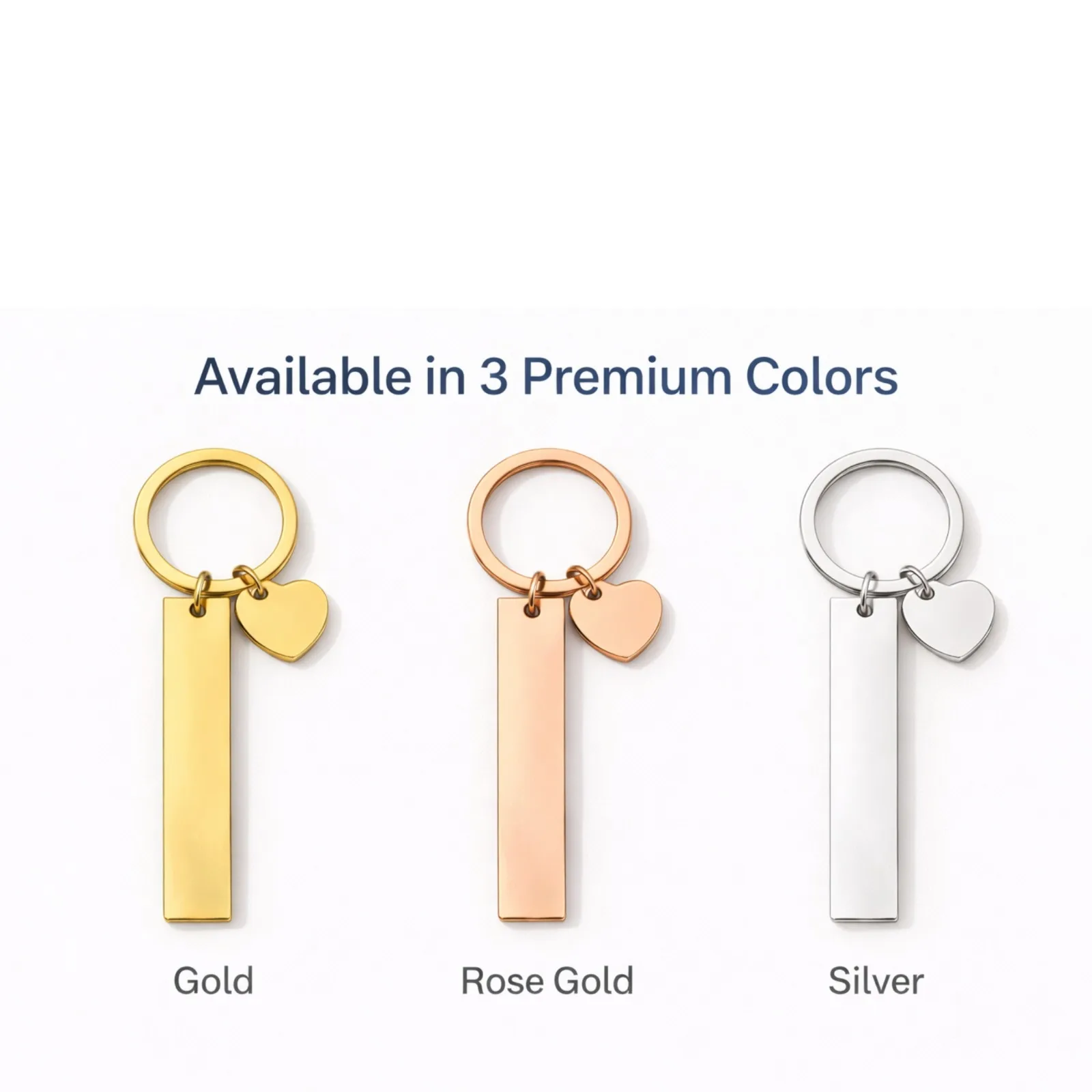 Engraved bar keychain with heart charm in gold, rose gold and silver finishes
