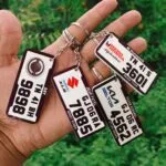 Custom acrylic car number plate keyrings with Suzuki, Kia and Honda logos