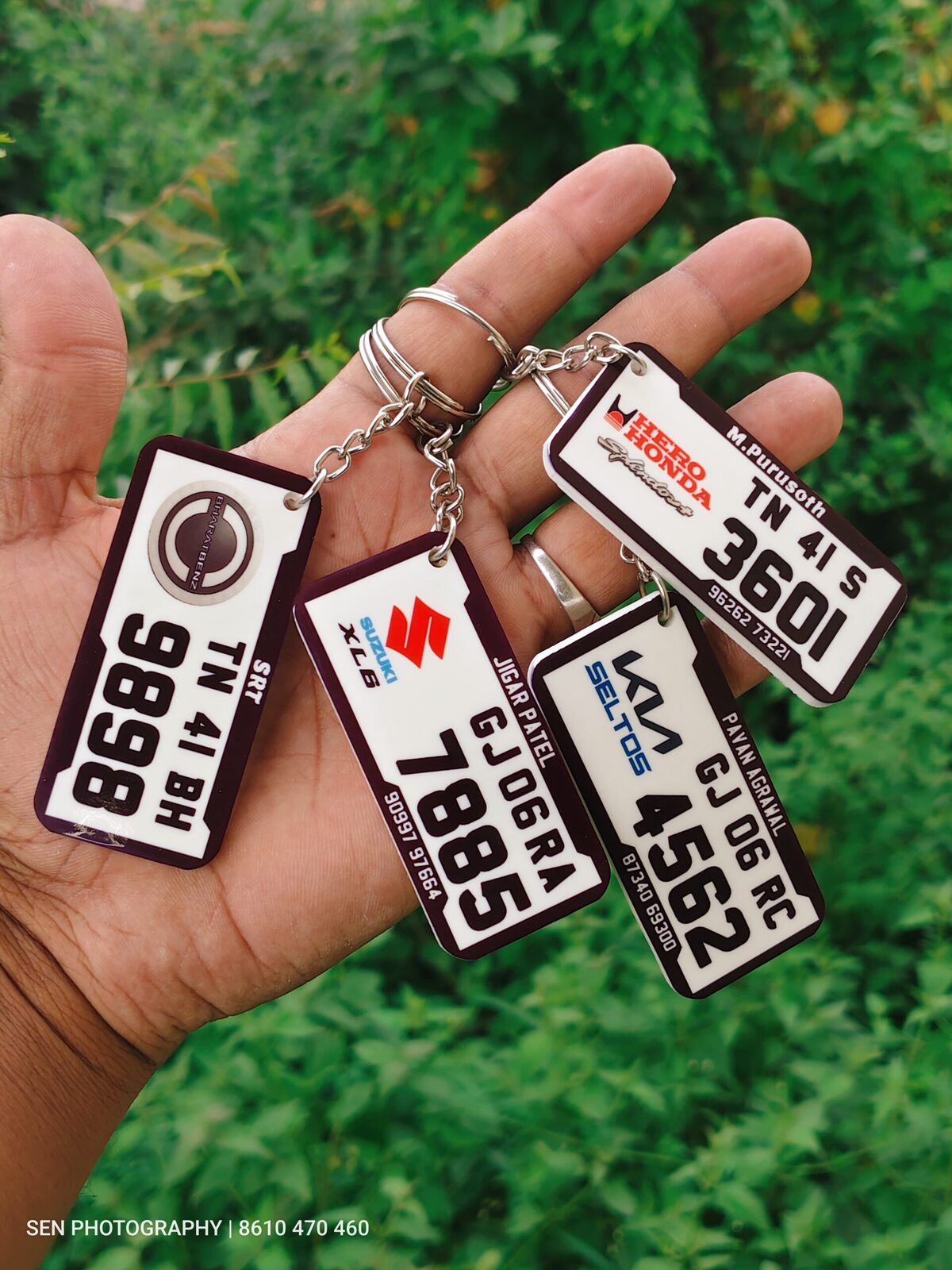 Custom acrylic car number plate keyrings with Suzuki, Kia and Honda logos