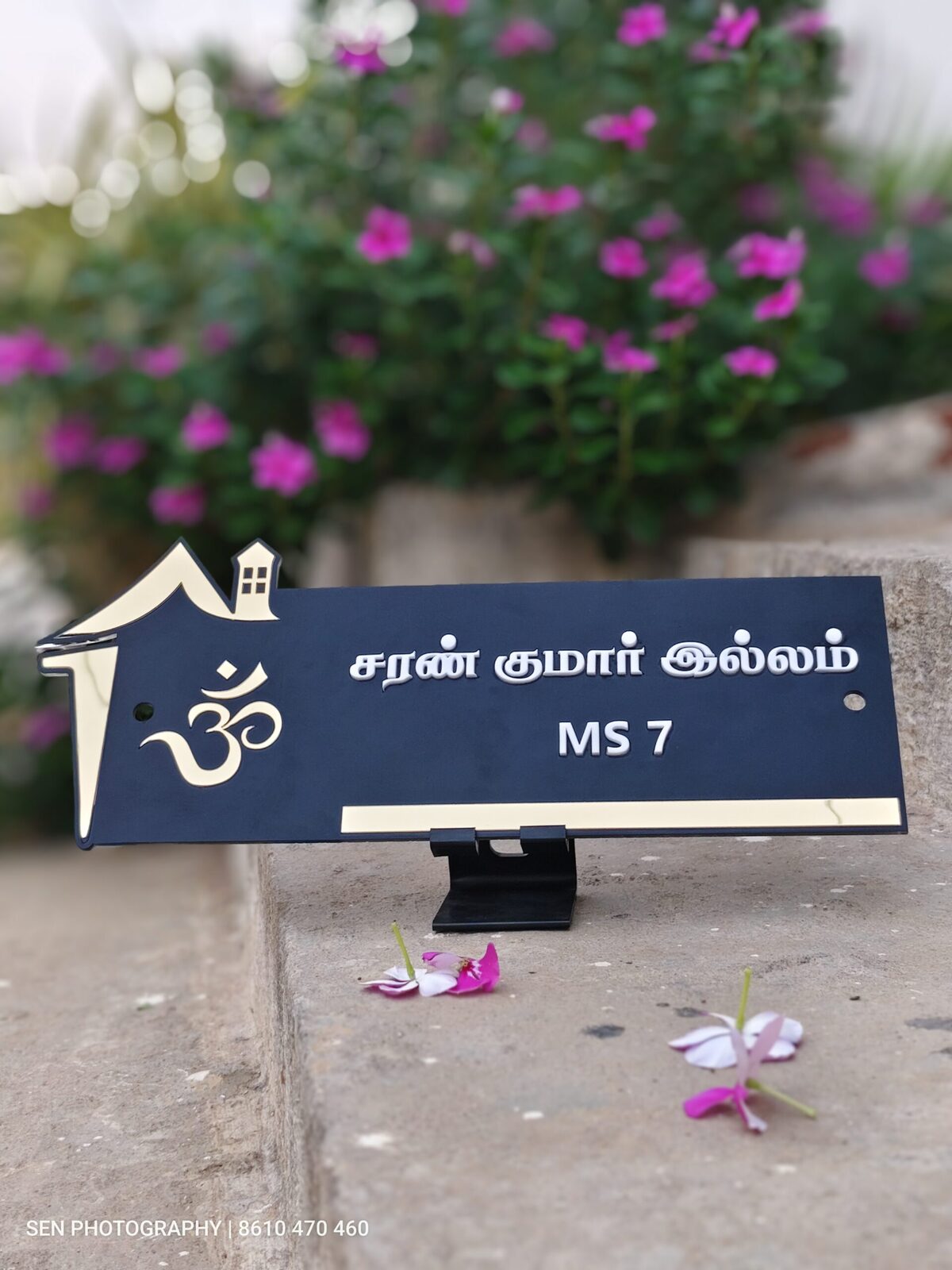 Blue acrylic name board with om symbol and house icon