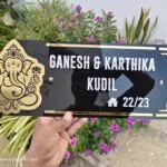 Acrylic house name plate with gold border and door number 22/23