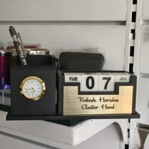 Wooden desk organiser with clock, perpetual calendar and engraved brass name plate