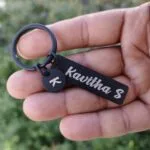 Personalised name keychain engraved with a name and initial charm