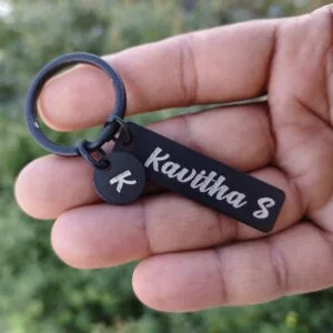 Personalised name keychain engraved with a name and initial charm