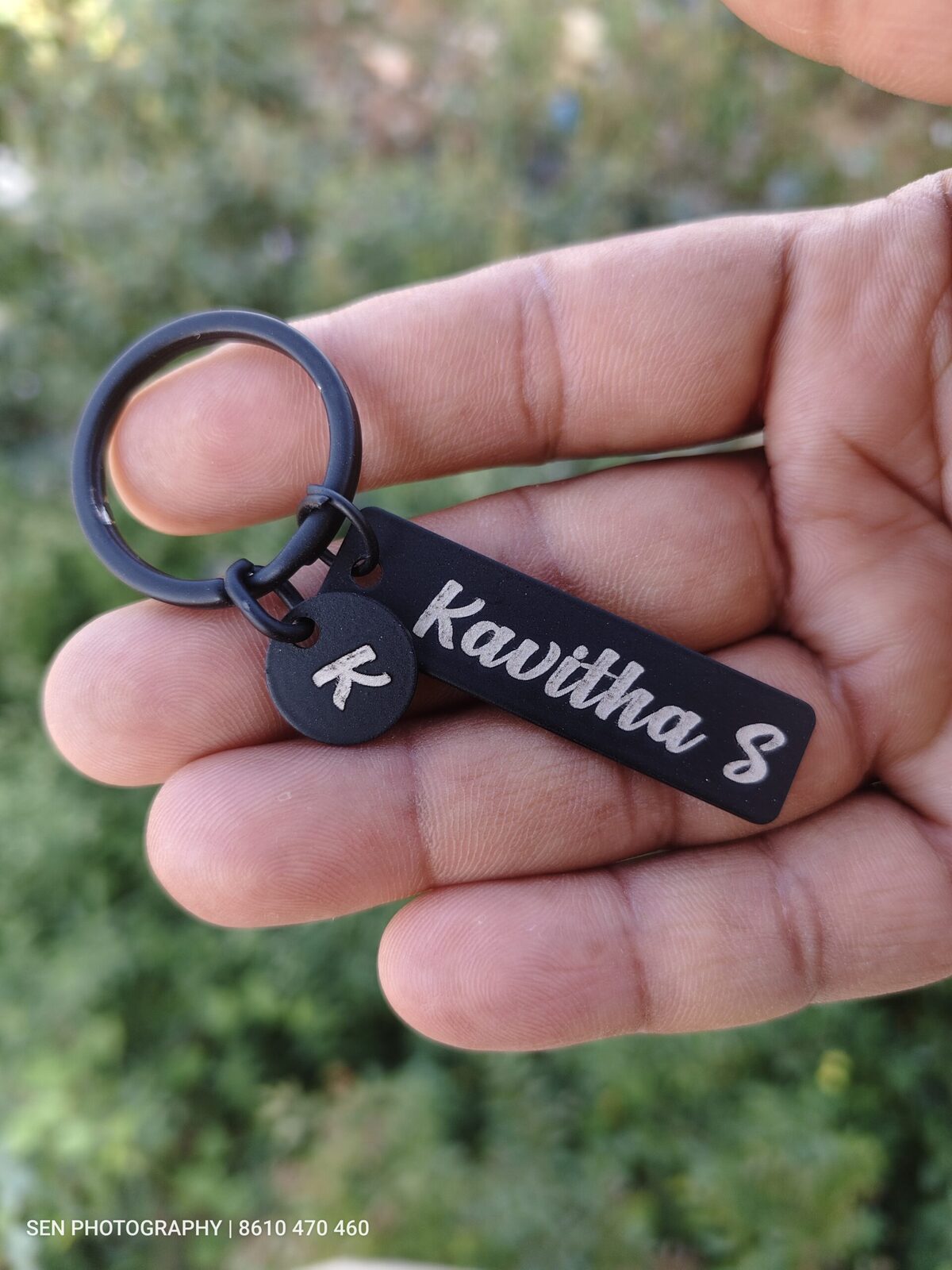 Personalised name keychain engraved with a name and initial charm