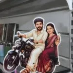 Custom shaped acrylic photo standee of a couple in traditional dress