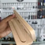 Wooden pen box with the sliding lid partly open