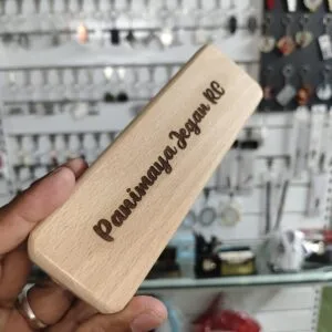 Wooden pen box engraved with a personalised name on the lid