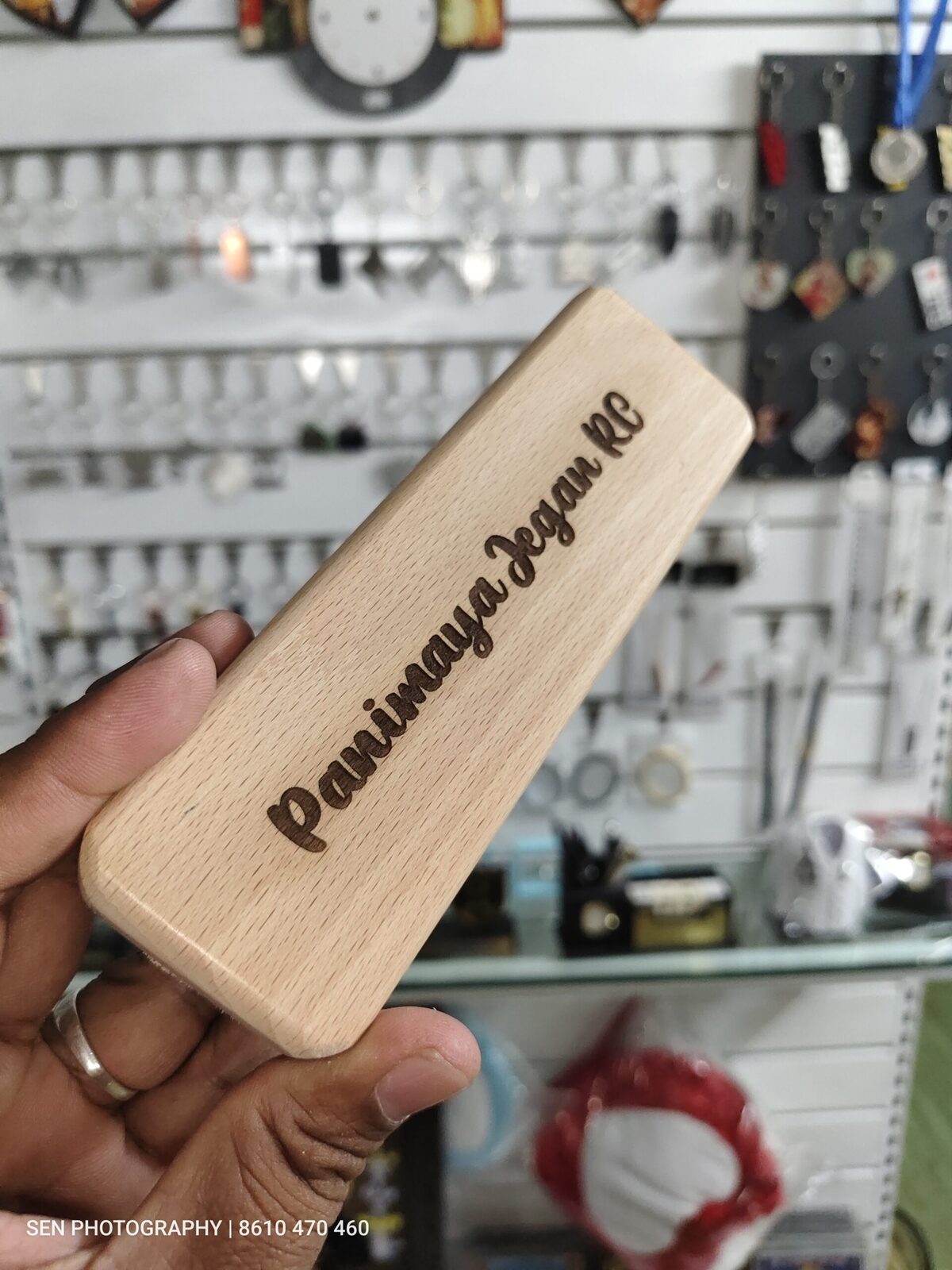 Wooden pen box engraved with a personalised name on the lid