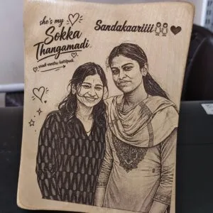 Wooden photo frame engraved with a portrait of two friends and Tamil text