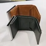 Open view of tan and black RFID card holder wallets
