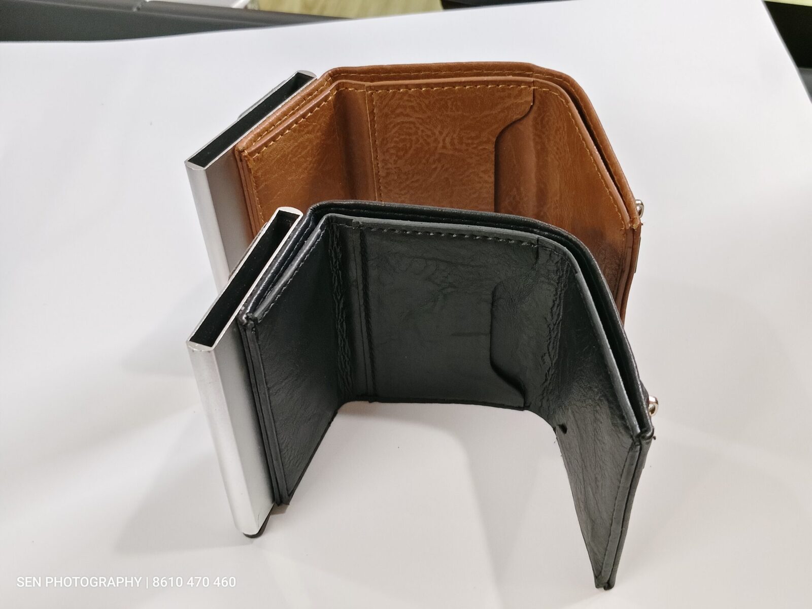 Open view of tan and black RFID card holder wallets