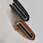Side profile of two slim metal card holder wallets