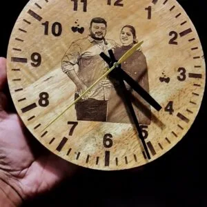 Wooden engraved photo wall clock face with clock hands